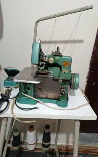 سردوز و چرخ خیاطی