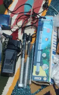 وسایل اکواریوم کامل در حد .وغذای ماهی