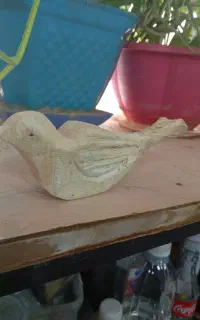 مجسمه دست ساز پرنده ی چوبی