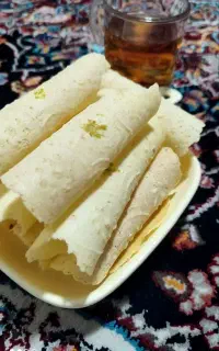 شیرینی نان لوله ای هل و گلاب و حلوا