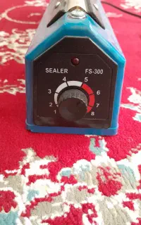 دستگاه پرس‌ حرارتی دوخت پلاستیک