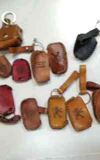 کیف چرم وجاکلیدی دستدوز وکمربند چرم طبیعی گاومیش
