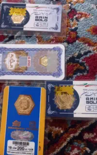 مقداری سکه و اسکناس قدیمی