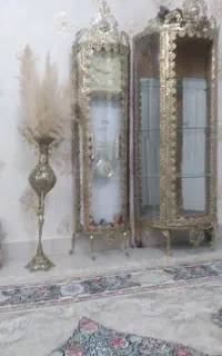 بوفه برنجی،ساعت برنجی گلدان برنجی،برنج خالصه