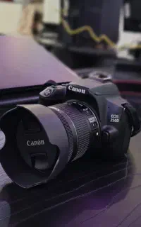 دوربین Canon 250D کم کار وتمیز با لنز 18-55 و جعبه