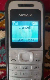 نوکیار۱۲۰۹ اصلی