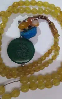 انگشترنقره وتسبیح شاه مقصوددست خورده
