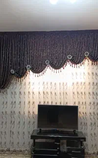 پرده و میز تلویزیون