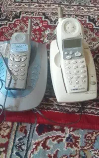 گوشی تلفن بیسیم و واکمن ضبط وپخش،میکروفن وباند