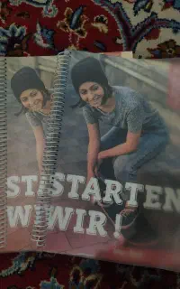 کتاب زبان آلمانی starten wir