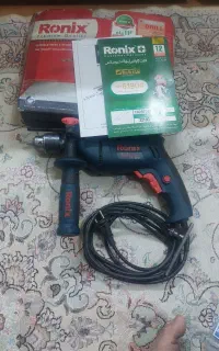 دریل چکشی رونیکس و شارژر باتری ابزار شارژی