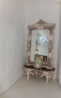 اینه و شمعدان و ساعت