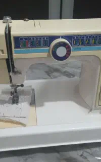 چرخ گلدوزی وجا دکمه زن