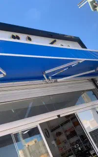 سایبان مغازه وتعمیر چادروکاور الاچیق پرده سلفون