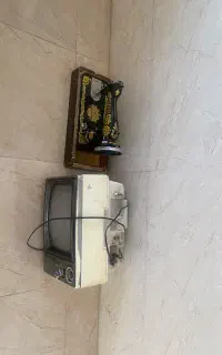 تلویزیون و چرخ قدیمی