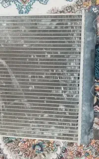رادیات پراید  نو و  جلو پنجره  پراید