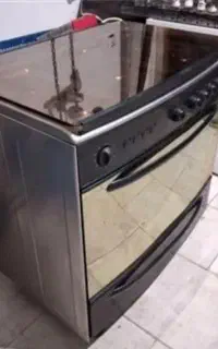 گاز ۵ شعله تکنو دارای فر  و  جوجوگردان