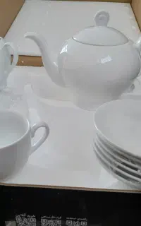سرویس چای خوری و قوری و استکان و فنجان نو نو
