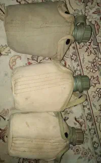 قمقمه ارتشی و کوله پشتی و کمربند ارتشی