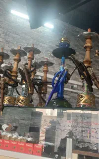 شاگرد در  کافه قلیان
