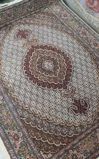 یک تخته قالیچه ماهی مرینوس کرم