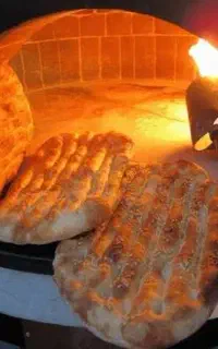 به یک شاطربرای نونوایی فر سنتی نیازمندیم