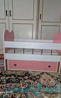 تخت خواب و کالسکه کودک