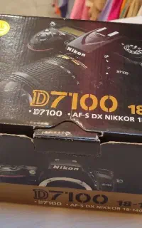 دوربین نیکون d7100 بعلاوه سه پایه فوتومکس