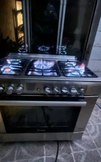 اجاق گازفرداروجوجه گردان سینجر