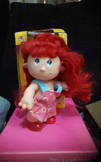 عروسک مو قرمز قد ۲۲ سانت