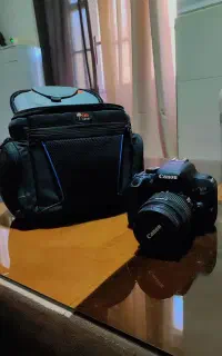 دوربین canon 800d با کیف ضربه گیر و کاور ضدآب