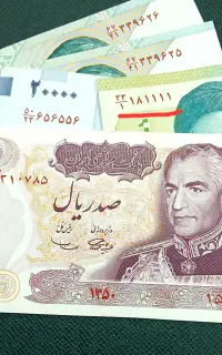 اسکناس صد ریالی و هزاری شماره رند