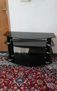 زیر تلویزیونی شیشه ای