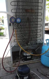 تعمیر یخچال فریزر و شارژ گاز دو میلیون تومان