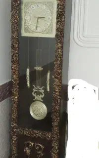 ایینه کنسول.. ساعت ایستاده..گیلم فرش در پلدختر