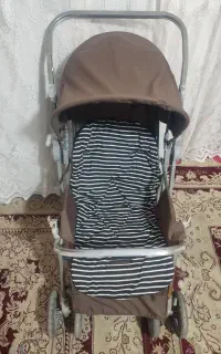 کالسکه قهوه ای