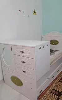 تخت خواب و کمد کودک