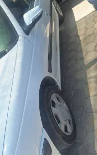 پژو‌پارس سفید بی رنگ