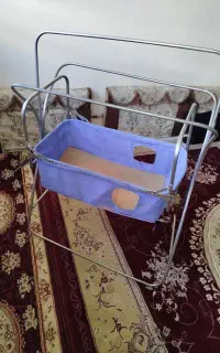 گهواره وکمک مادر