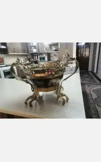 فروش یک جفت شمعدانی کریستال ویک عدد میوه خوری برنز