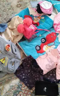 ست قنداق فرنگی و روتختی و چند دست لباس نوزادی