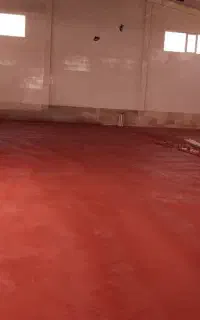 بتن ریزی کف با ماله پروانه ای