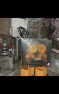 دستگاه آب پرتقال گیری زومیکس المان