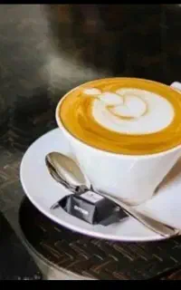 باریستا در قهوه فروشی