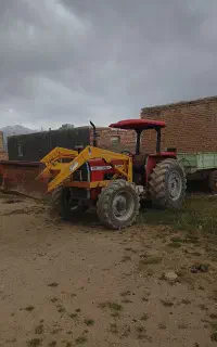 کار با تراکتور بیل دار