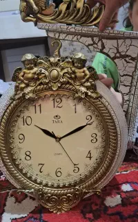 ساعت دیواری دوطرفه
