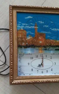 چراغ شب حرم ساعت دار