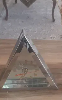 ساعت استیل و ۲ عدد شمعدان