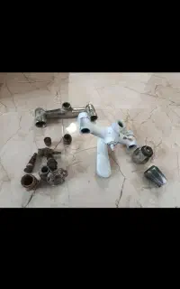 شیر حمام وانبر دست وآچار وقفل آره وقیچی