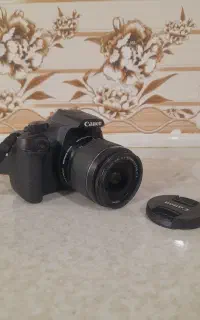 دوربین کانن 1300d با همه تجهیزات لازم